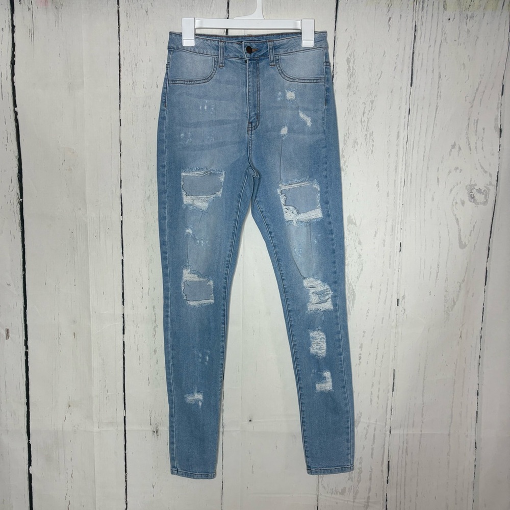 Fashion Nova Light Blue Distressed Skinny Jeans